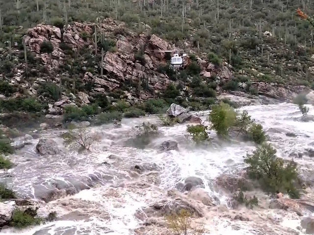 17 hikers rescued from flooded creek