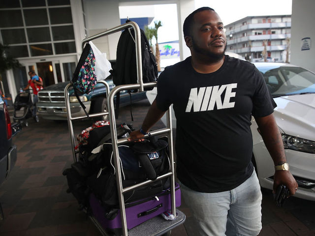 Approaching Hurricane Florence snarls travel