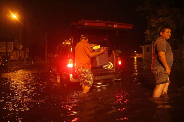 As Florence batters Carolina coast, it is downgraded to category 1 hurricane